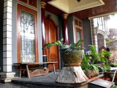 desain rumah minimalis pakai batu alam